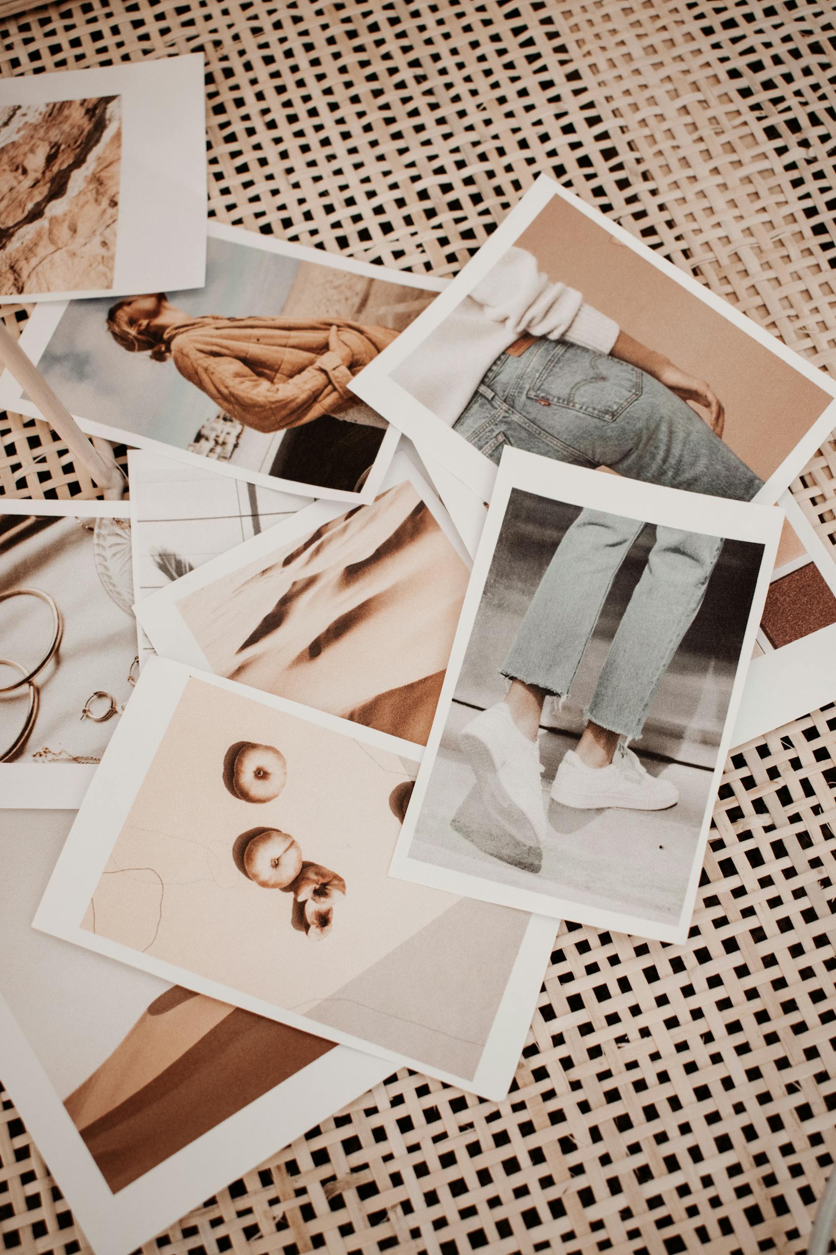 A creative collage of printed analog-style photos showcasing various moods and compositions.